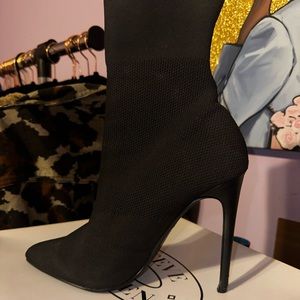 Steve Madden sock boots. Snug fit.